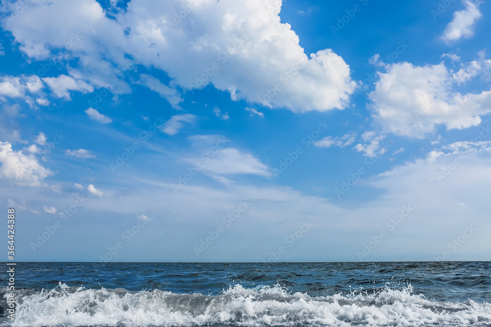 View of beautiful sky with clouds near sea View of beautiful sky with clouds near sea