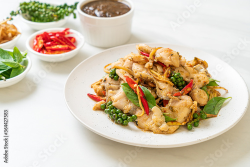 stir fried holy basil with fish and herb