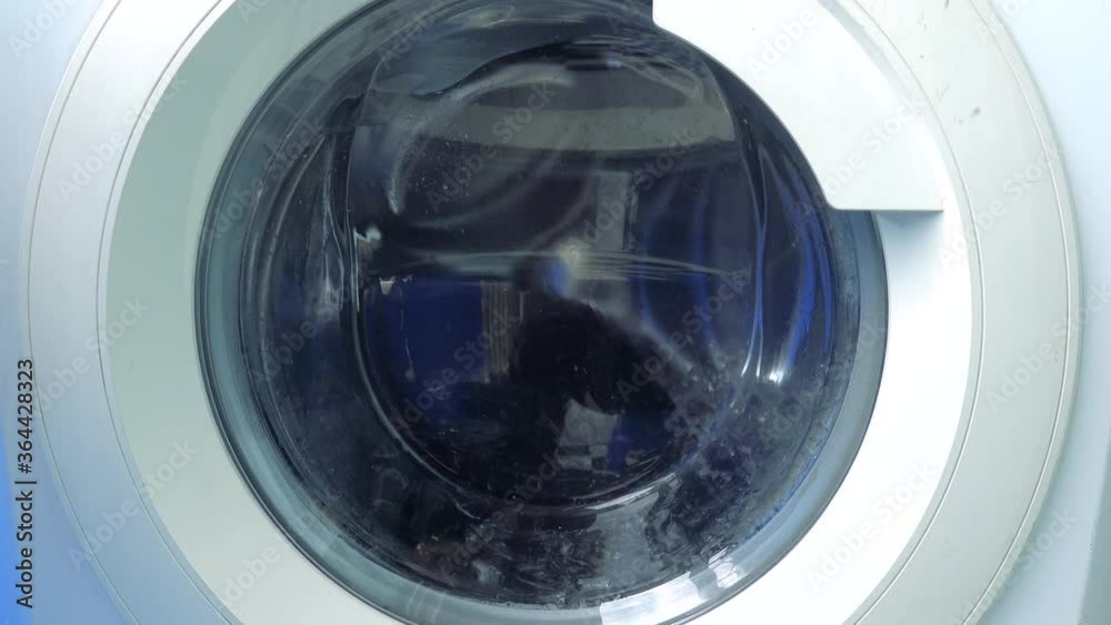 clothes in washing machine. clothes in washing machine.