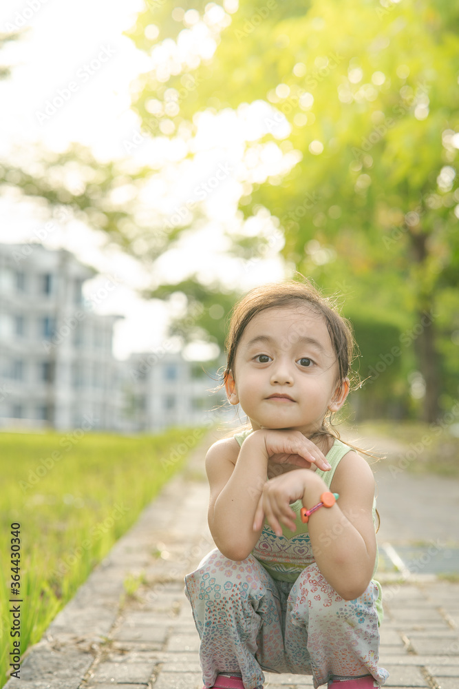 Portrait of a toddler walking outdoor. Enjoying nature. Portrait of a toddler walking outdoor. Enjoying nature.