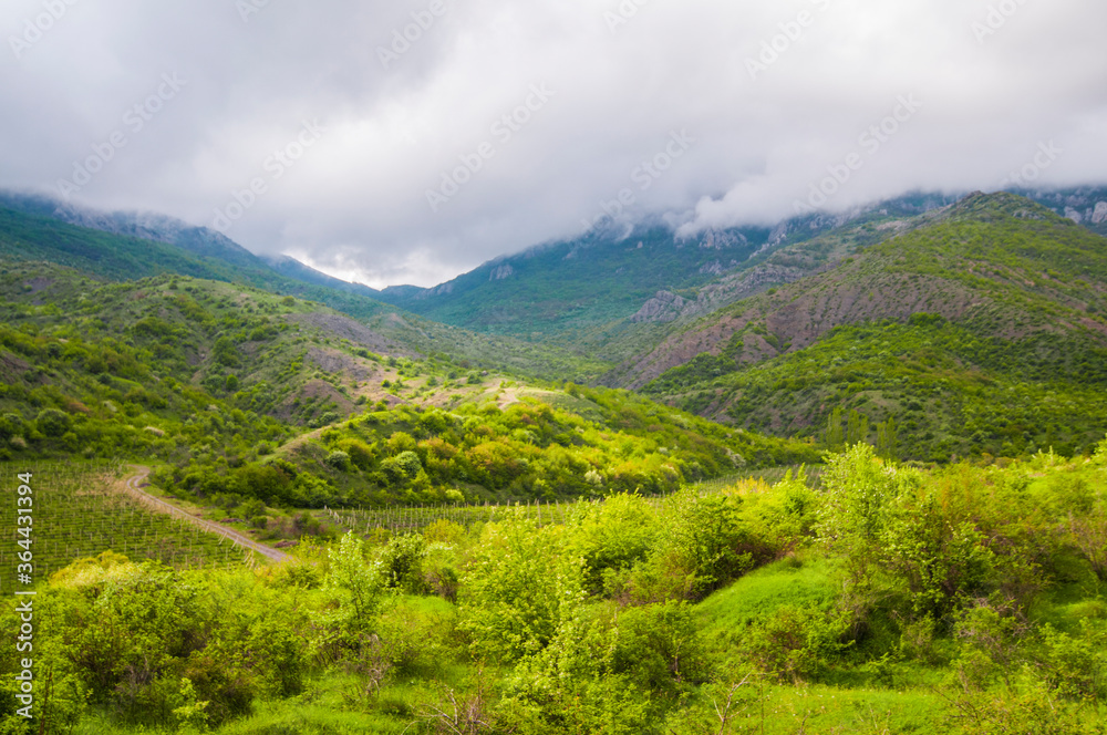 Picturesque view, rain clouds in mountains