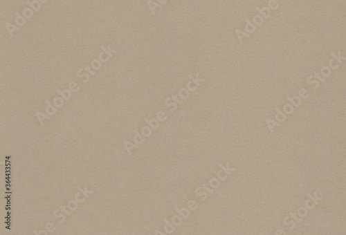 Textured brownish grey coloured carton paper background. Extra large highly detailed image.