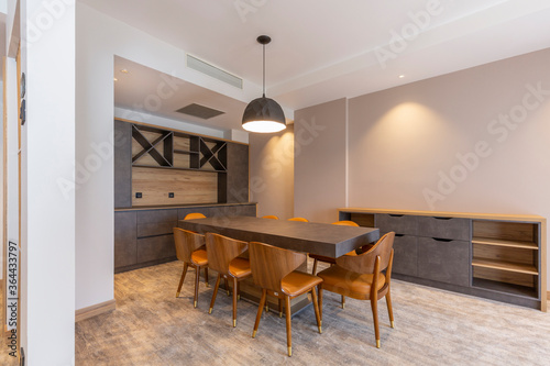 Interior of a dining room in modern hotel apartment