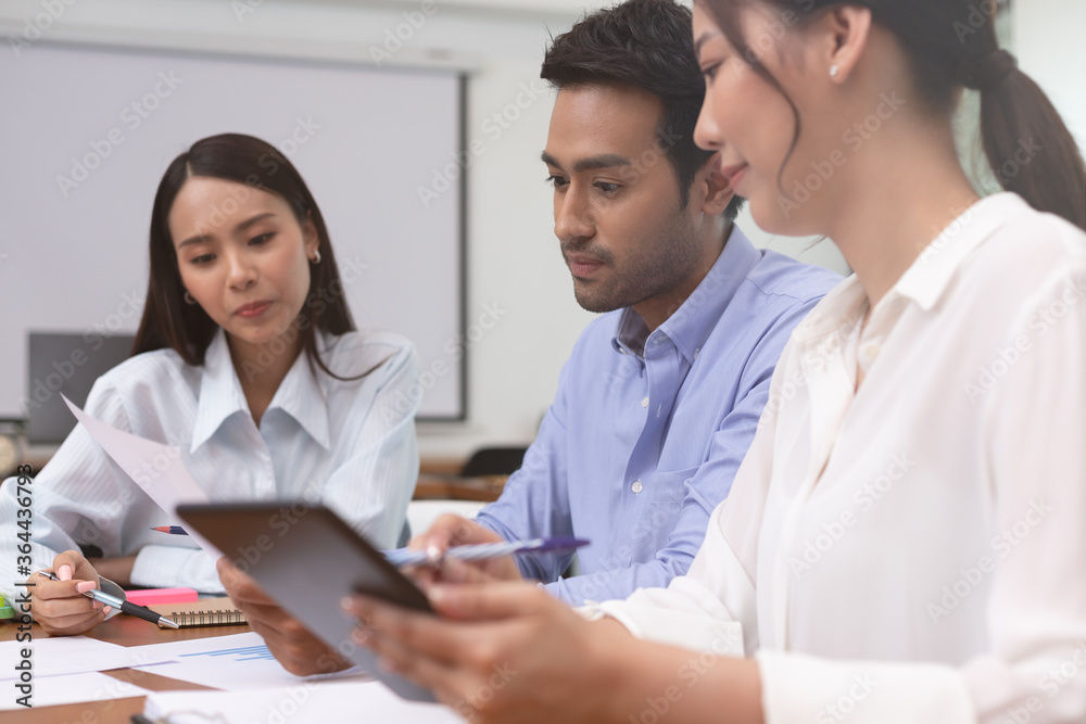 Asian business man and women meeting and talk about job in office. Asian business man and women meeting and talk about job in office.