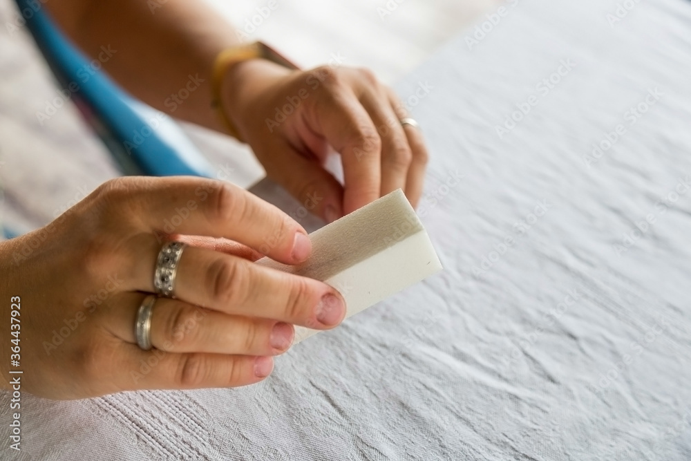 removing the enamel. the nail polish remover removing the enamel. the nail polish remover