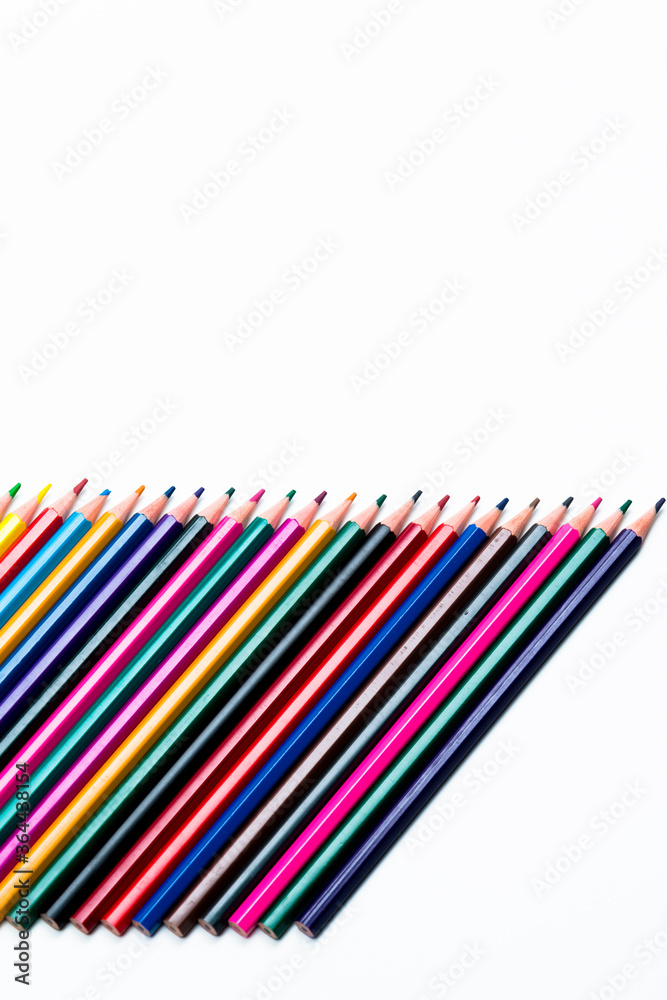 Craft Ideas. Closeup of Line of Various Colorful Crayons Placed Closely in Row. Isolated Against White. Craft Ideas. Closeup of Line of Various Colorful Crayons Placed Closely in Row. Isolated Against White.