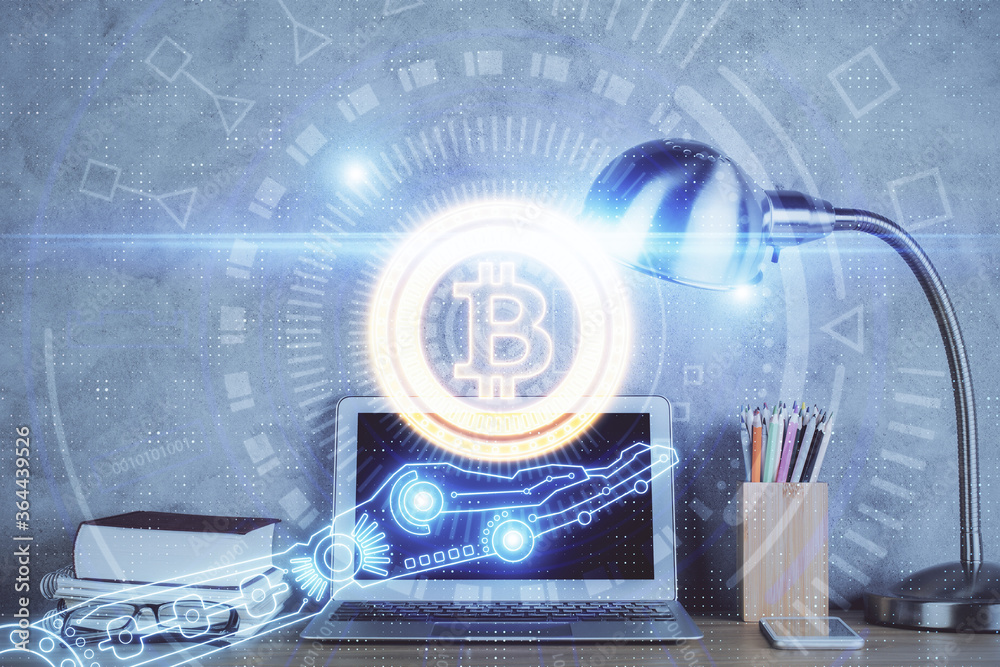 Double exposure of blockchain and crypto economy theme hologram and table with computer background. Concept of bitcoin cryptocurrency. Double exposure of blockchain and crypto economy theme hologram and table with computer background. Concept of bitcoin cryptocurrency.
