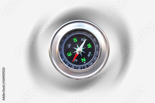 round compass on abstract background as symbol of tourism with compass, travel with compass and outdoor activities with compass © yarbeer