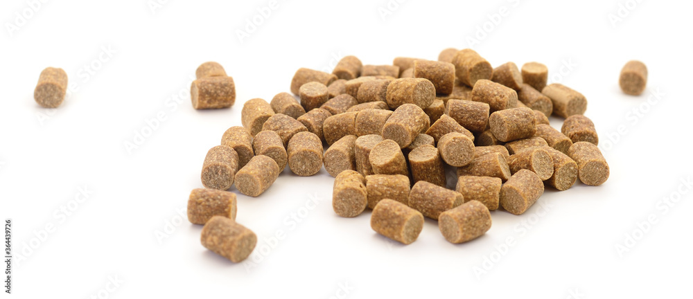 Pile of compound fish feed pellets. Pile of compound fish feed pellets.
