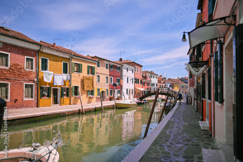 Fototapeta Naklejka Na Ścianę i Meble -  Venice landmark, Burano island canal, colorful houses and boats,