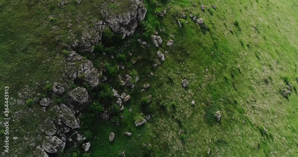 Amazing, aerial view of a green, steep mountainous region. Amazing, aerial view of a green, steep mountainous region.