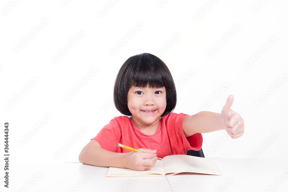 kid doing homework on white background, child writing paper
kid doing homework on white background, child writing paper