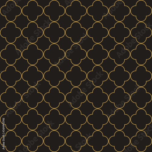 Quatrefoil pattern vector in gold and black. Seamless islamic geometric pattern motif for wallpaper  packaging  or textile decorative print. Classic traditional luxury design.