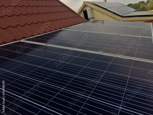 Solar panels on the roof. Alternative energy. Sunlight power