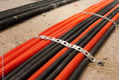 installation of Underfloor heating in corrugated pipes close-up