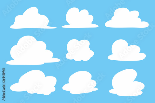 Clouds silhouette vector set isolated on a blue background.