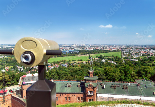 Tourist telescope for landscape exploring in Krakow (Cracow) from Kopiec Kosciuszki. Poland.