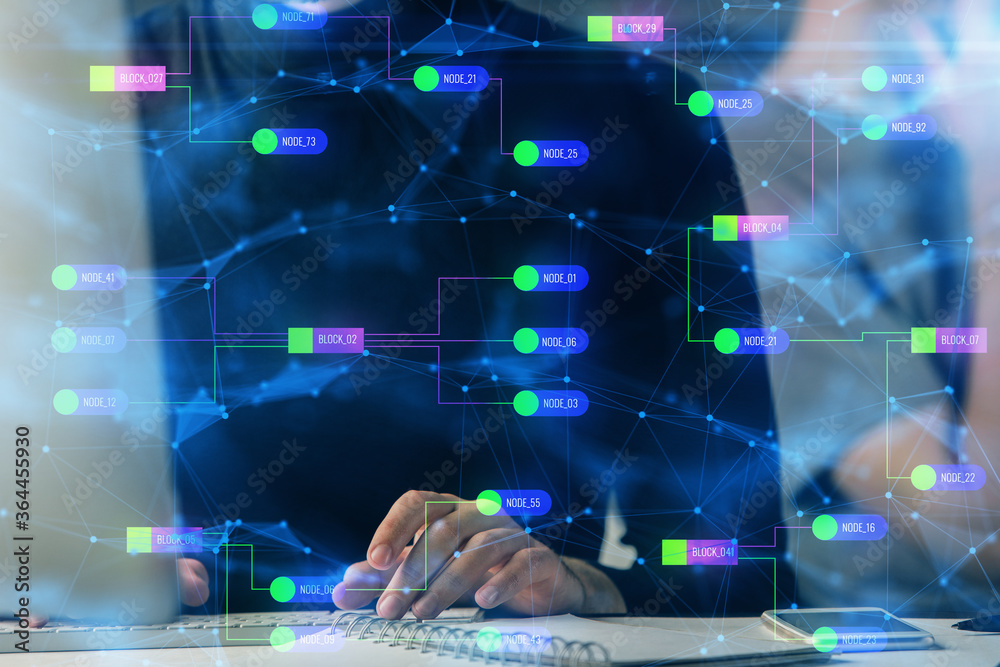 Multi exposure of data internet theme hologram with man working on computer on background. Concept of innovation.