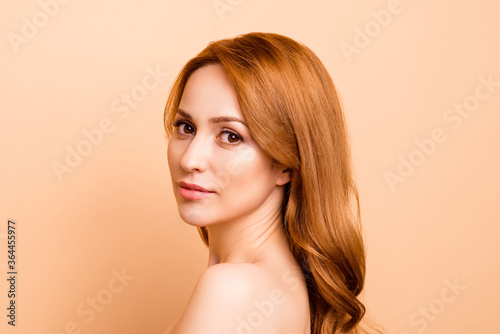 Profile side view close-up portrait of her she nice-looking attractive nude naked pure shine confident wavy-haired lady facial vitamin organic smooth clean clear isolated over beige background