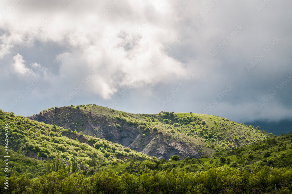 Picturesque view, rain clouds in mountains