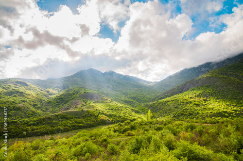 Picturesque view  rain clouds in mountains