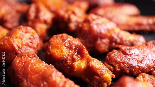 Closeup of spicy hot buffalo wings on a plate