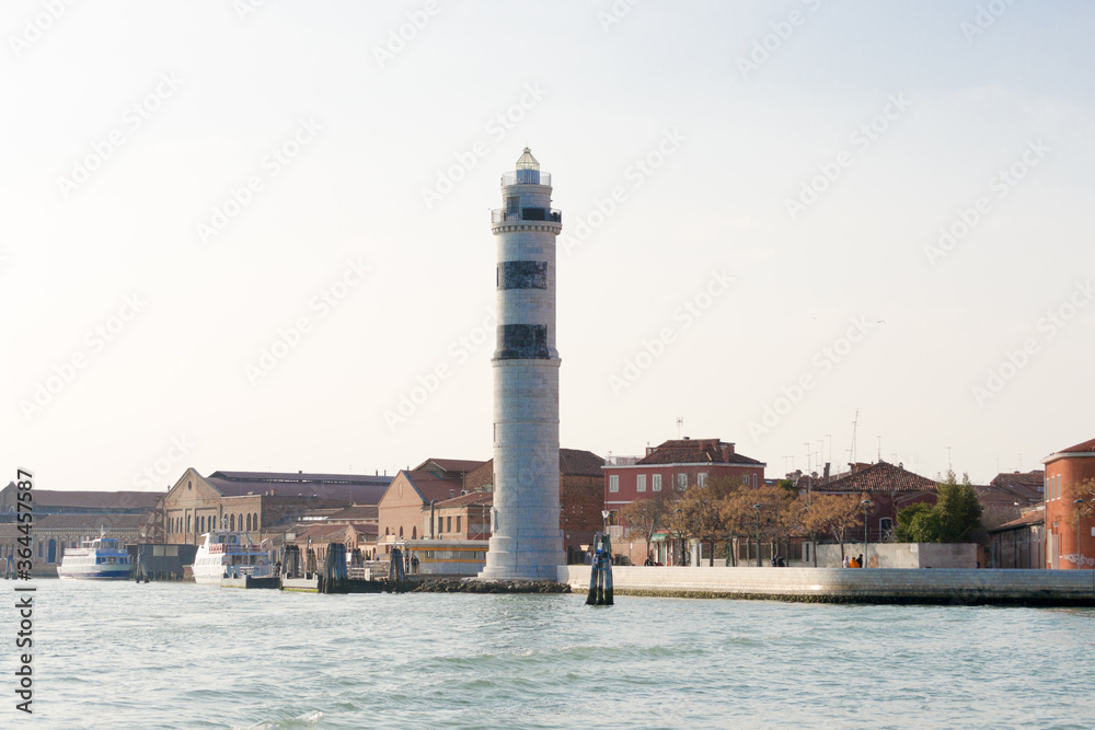 The beautiful lighthouse of Murano, the island in Venice lagoon famous for the glass production.From time to time there has always been a lighthouse here, this new one is made of white istria stone