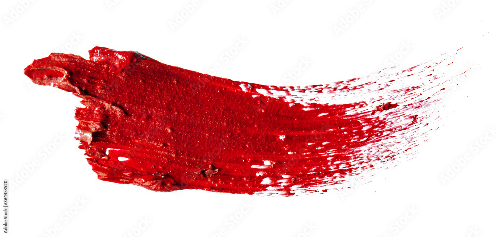 Stain swatch of a red matte lipstick on white background Stain swatch of a red matte lipstick on white background