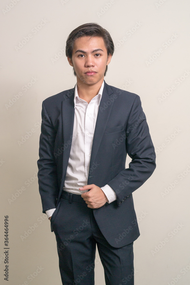 Portrait of young Filipino businessman in suit Portrait of young Filipino businessman in suit