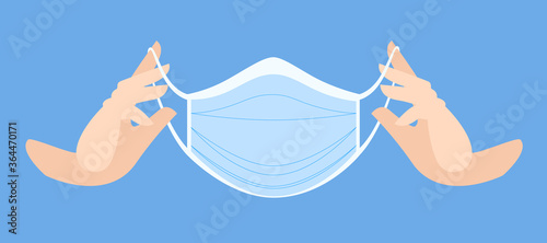 Medical mask in clean hands. Protective medical face mask against viruses and bacteria. put on a mask. medical care. professional medical accessories.