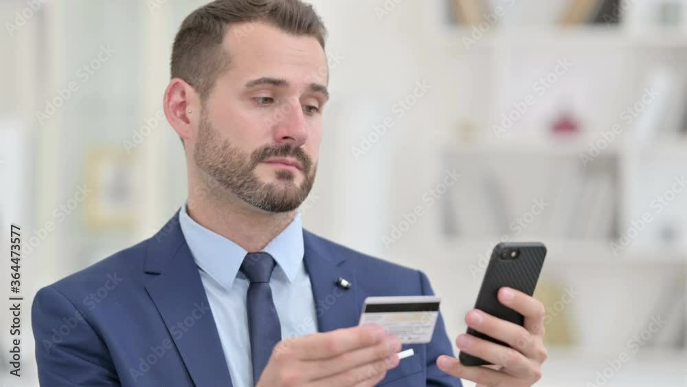 Portrait of Businessman making Online Payment on Smartphone Portrait of Businessman making Online Payment on Smartphone