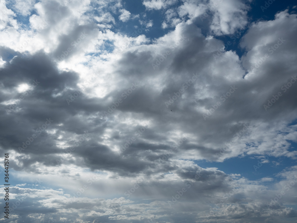 Obraz premium Dramatic clouds in the blue sky