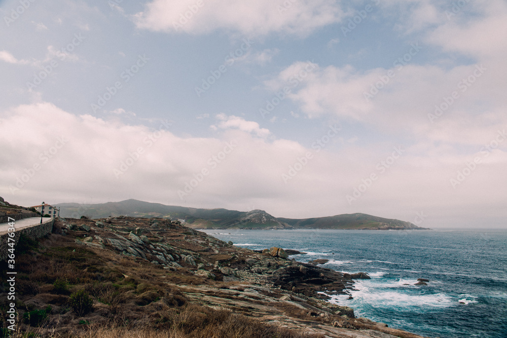 Cloudy Sky on the Rocky Coast of Finisterre, Spain
