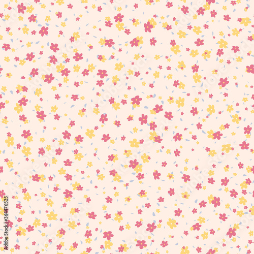 Vector seamless pattern with small pretty pink and yellow flowers on beige backdrop. Liberty style millefleurs. Simple floral background. Elegant ditsy ornament. Repeat minimal design for wallpapers