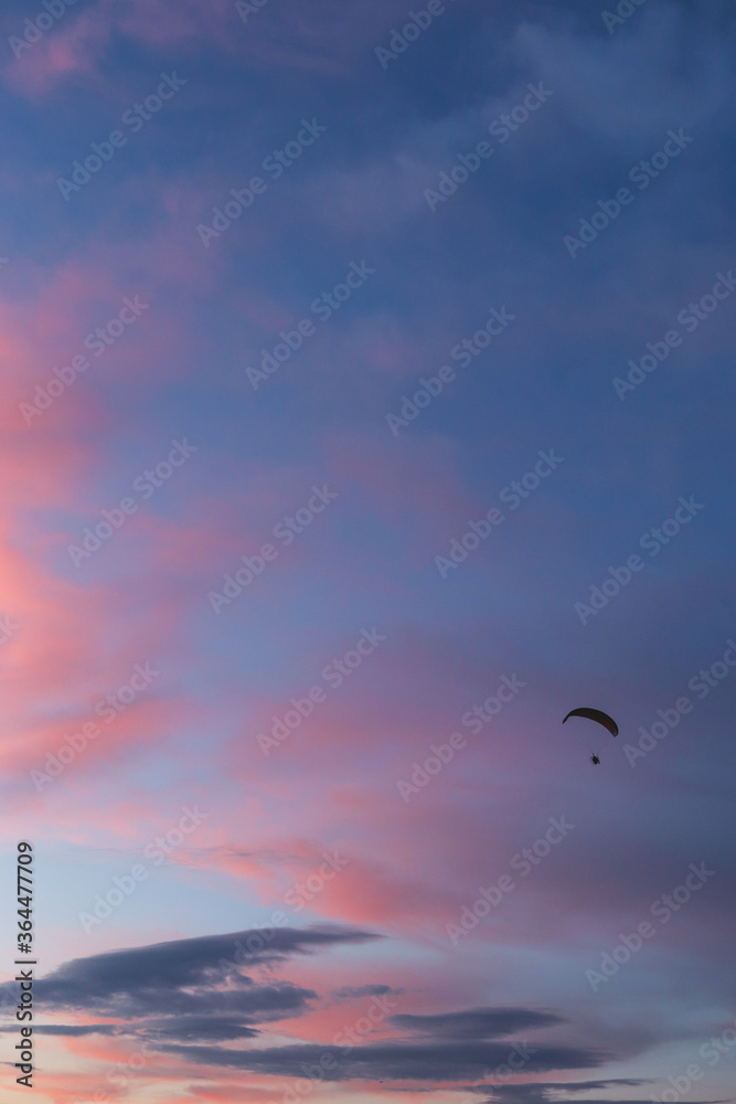 small paraglide on the sky