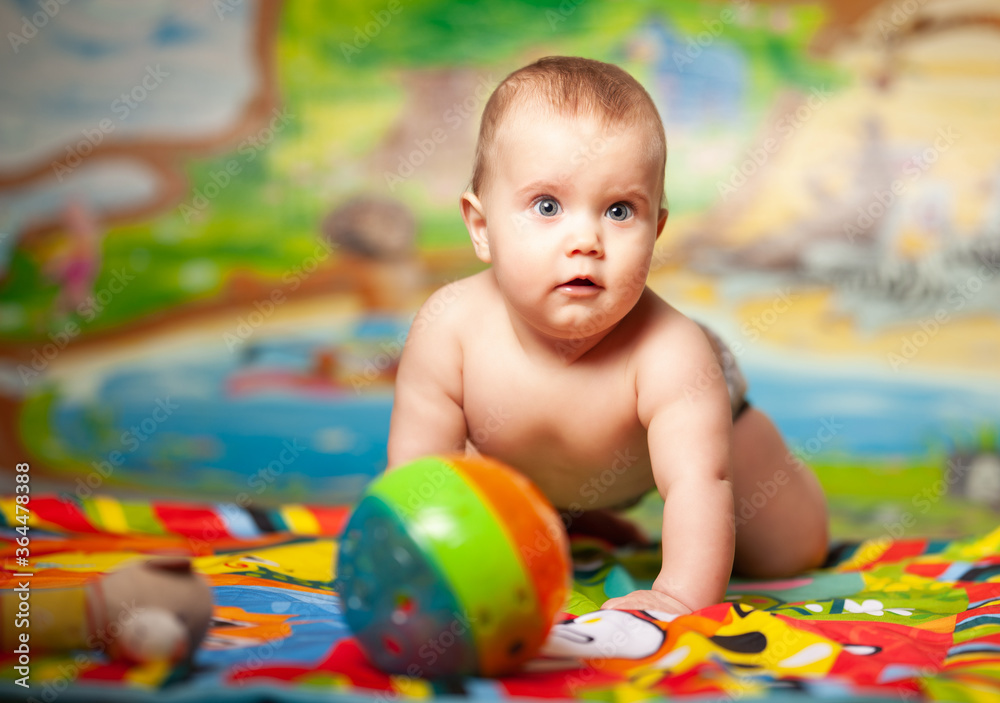 Obraz premium Portrait of a cheerful smiling caucasian little six-month-old girl