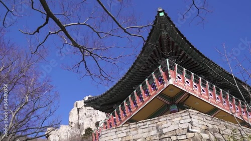 A panning shot of buddhist temple in South Korea during winter (shoot info: Cin2, 1080p, 23.97fps slowmotion from 59.94fps) photo