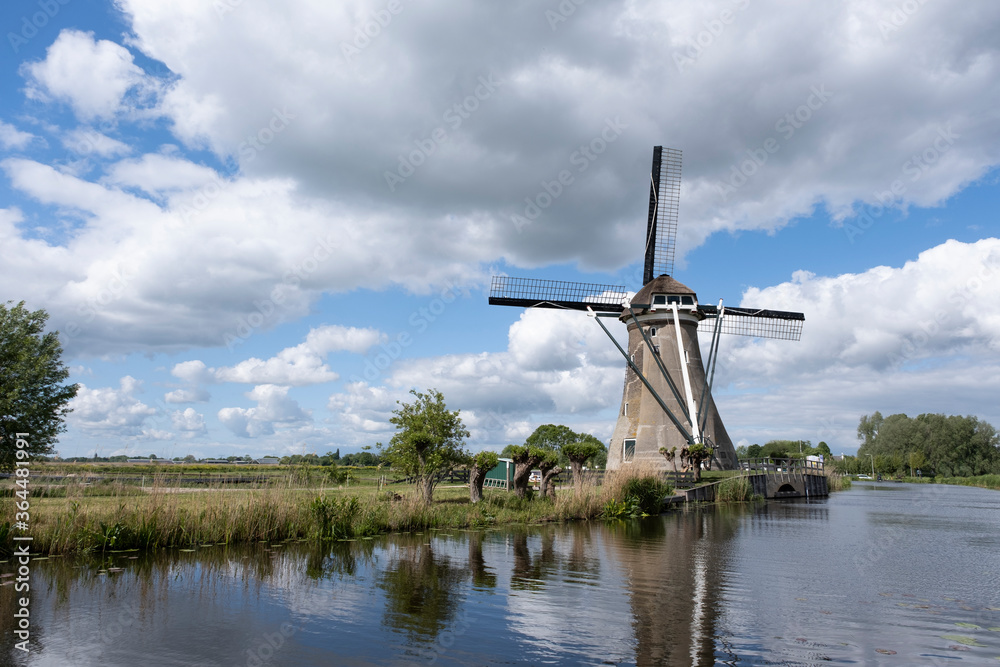 Traditional setting of the historical dutch windmills landscape, Holland