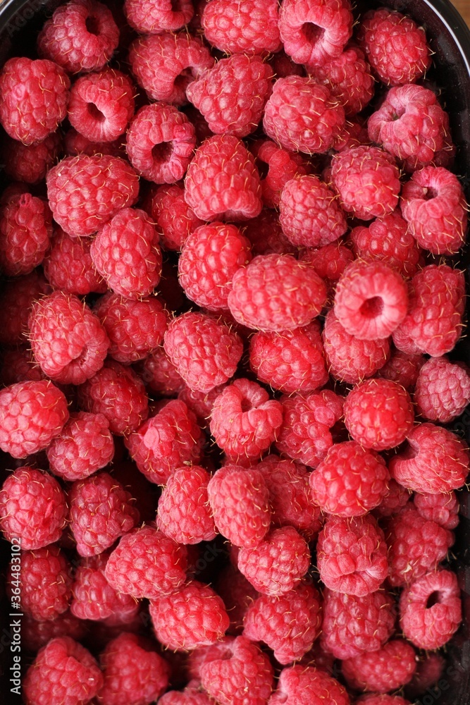 Delicious ripe raspberries on the market macro Delicious ripe raspberries on the market macro