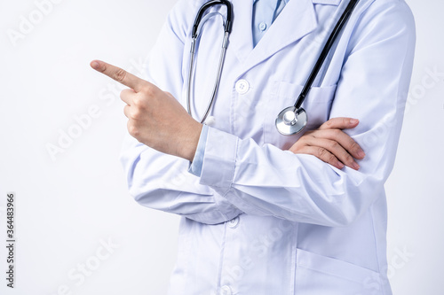 Female doctor body part with hand gesture, young woman physician with stethoscope isolated on white background, close up, cropped view, copy space