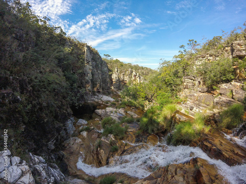 Large canyon with a small river running across the rocks at Serra da Canastra region in Brazil.
