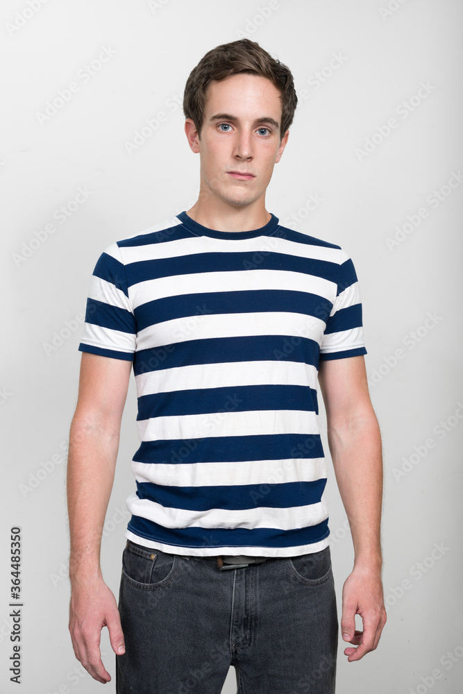 Portrait of young handsome man looking at camera Portrait of young handsome man looking at camera