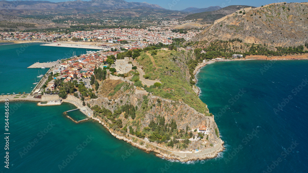 Aerial drone photo of picturesque village of Nafplio in the slopes of Palamidi fortress and Acronafplia, Argolida, Peloponnese, Greece
