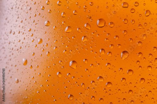 Texture of wet glass of ice cold pale beer