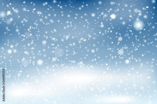 Winter Snowfall and snowflakes turquoise blue background. snowflakes in different shapes and forms, snowdrifts. Winter landscape with falling christmas shining beautiful snow. 