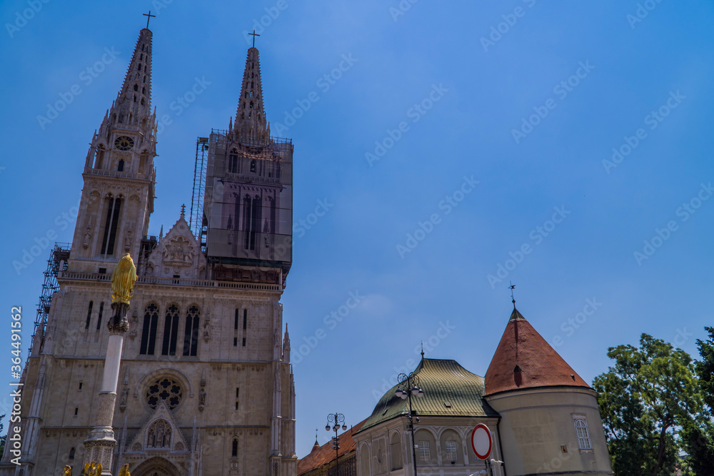 Zagreb Cathedral under renovation with ancient buildings next to it