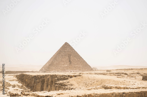 great pyramids of giza  Egypt. Scenic view from the desert. Unesco heritage location. Famous archeology landmark. Ancient architecture of the pyramids. 