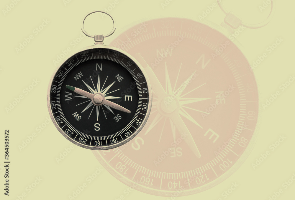 round compass on abstract background as symbol of tourism with compass, travel with compass and outdoor activities with compass round compass on abstract background as symbol of tourism with compass, travel with compass and outdoor activities with compass