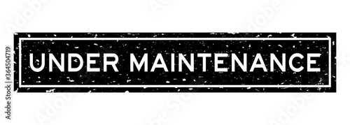 Grunge black under maintenance word square rubber seal stamp on white background