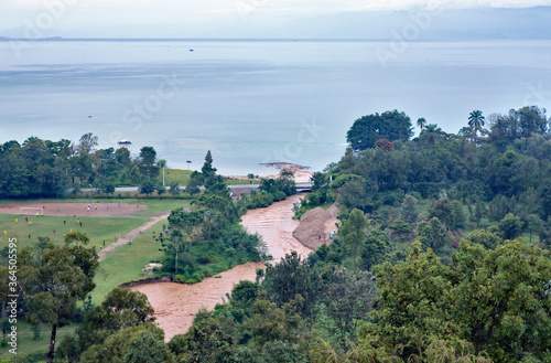 Mouth of Sebeya river in Lake Kivu (Rwanda); people are digging sand deposited by the river due to upstream erosion photo